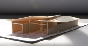 model shows split roof lines of house design